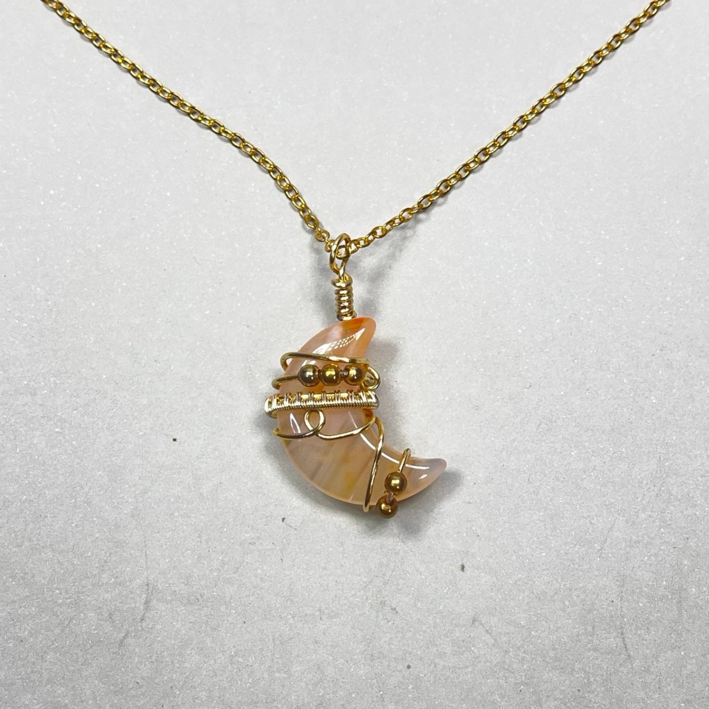 dyed orange agate moon pendant