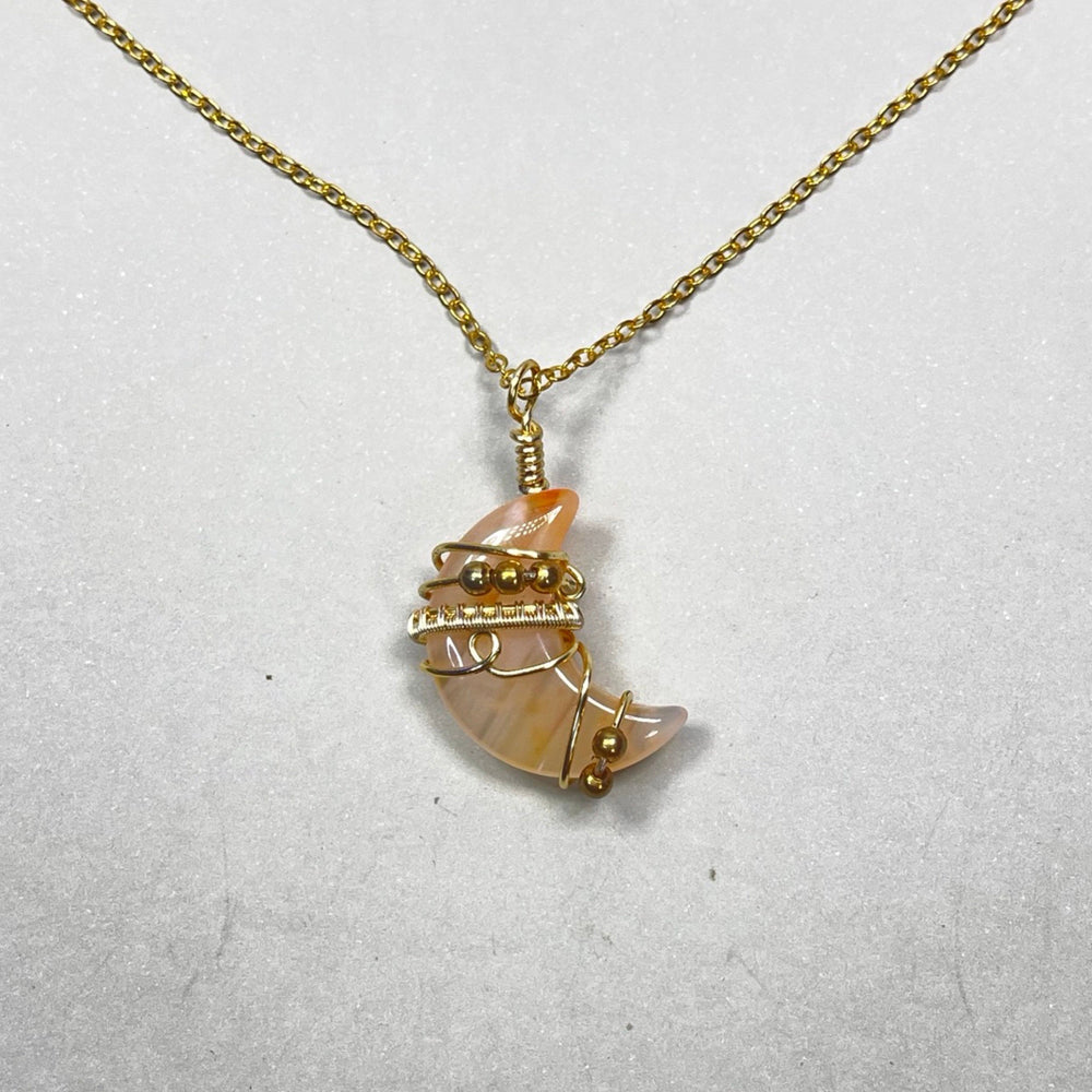 dyed orange agate moon pendant